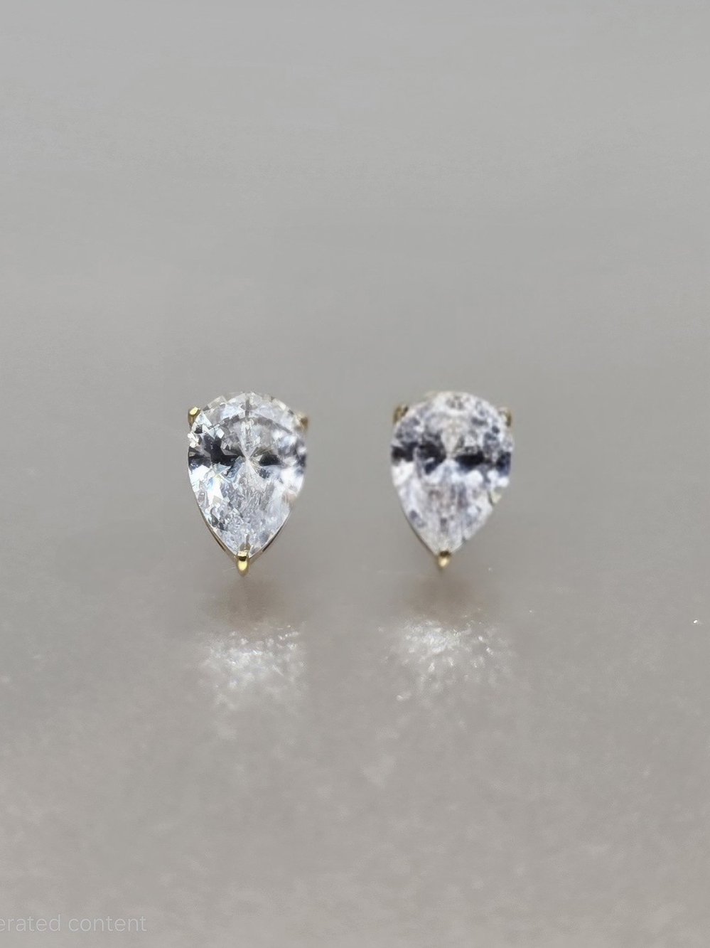 Teardrop Cubic Zirconia Stud Earrings in Gold
